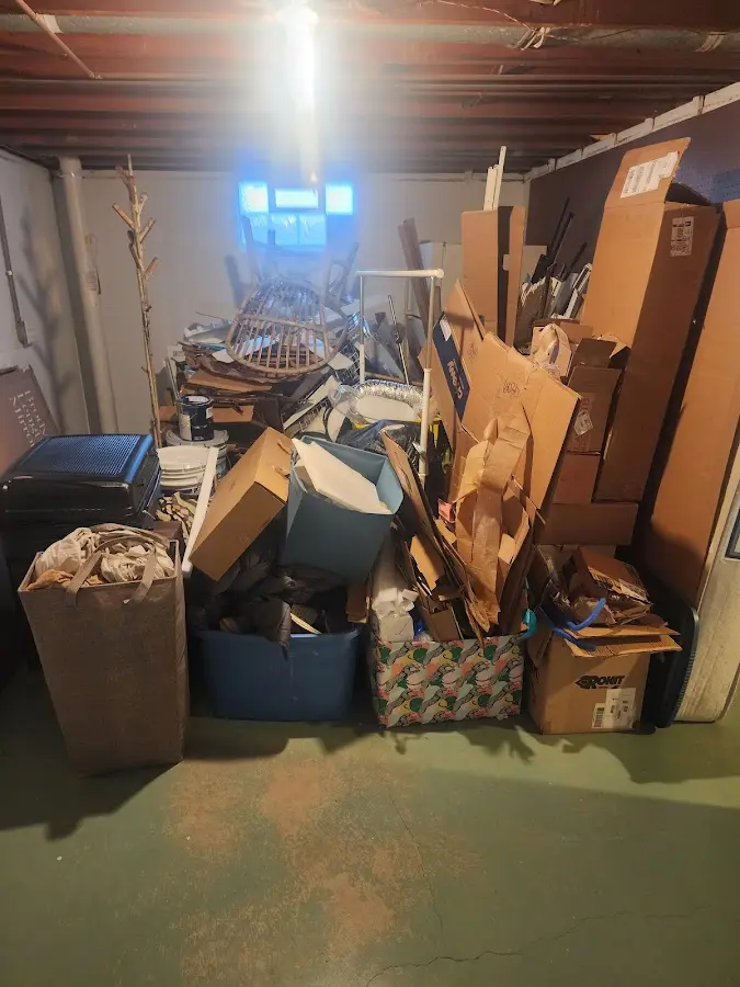 Roll-off dumpster container at job site for Yard Waste Dumpster Rental in Saratoga Springs